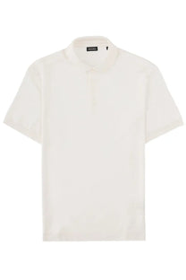 A crisp white zegna men’s polo shirt in cotone seta with short sleeves and classic collar with button placket