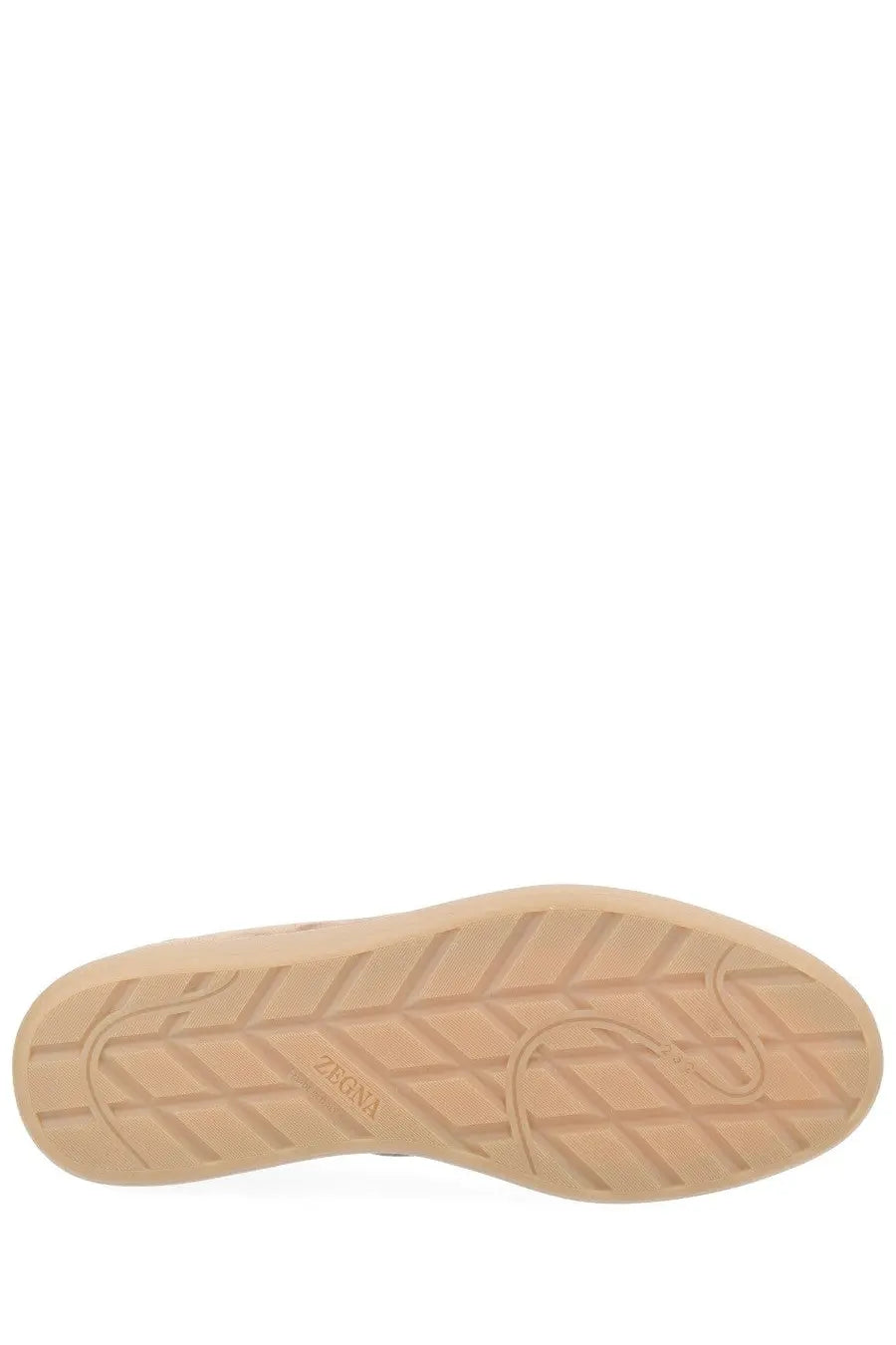 Tan rubber sole with geometric tread pattern and zara brand name embossed near the heel of zegna men’s sneaker beige