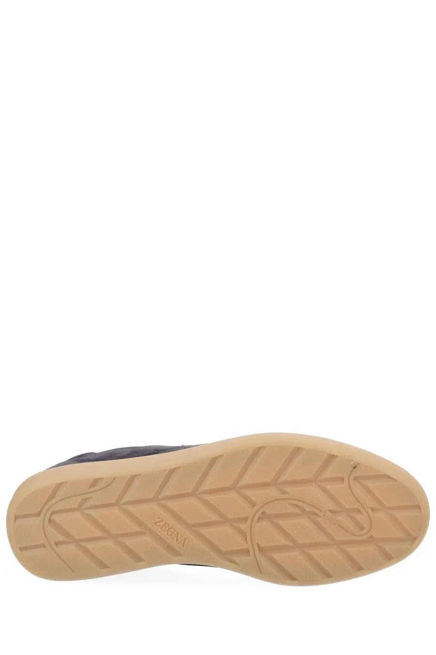 Tan rubber sole with geometric tread pattern and zara embossing near the heel on zegna men’s sneaker brown