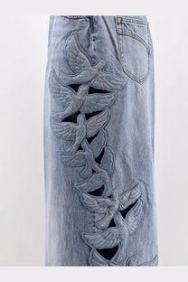 Zimmermann women’s alchemy applique relaxed flare light-wash denim skirt with vertical embroidered dove cut-out detailing