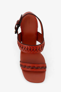 Zimmermann women’s alchemy leather sandals sienna with rust-colored braided straps and black buckle