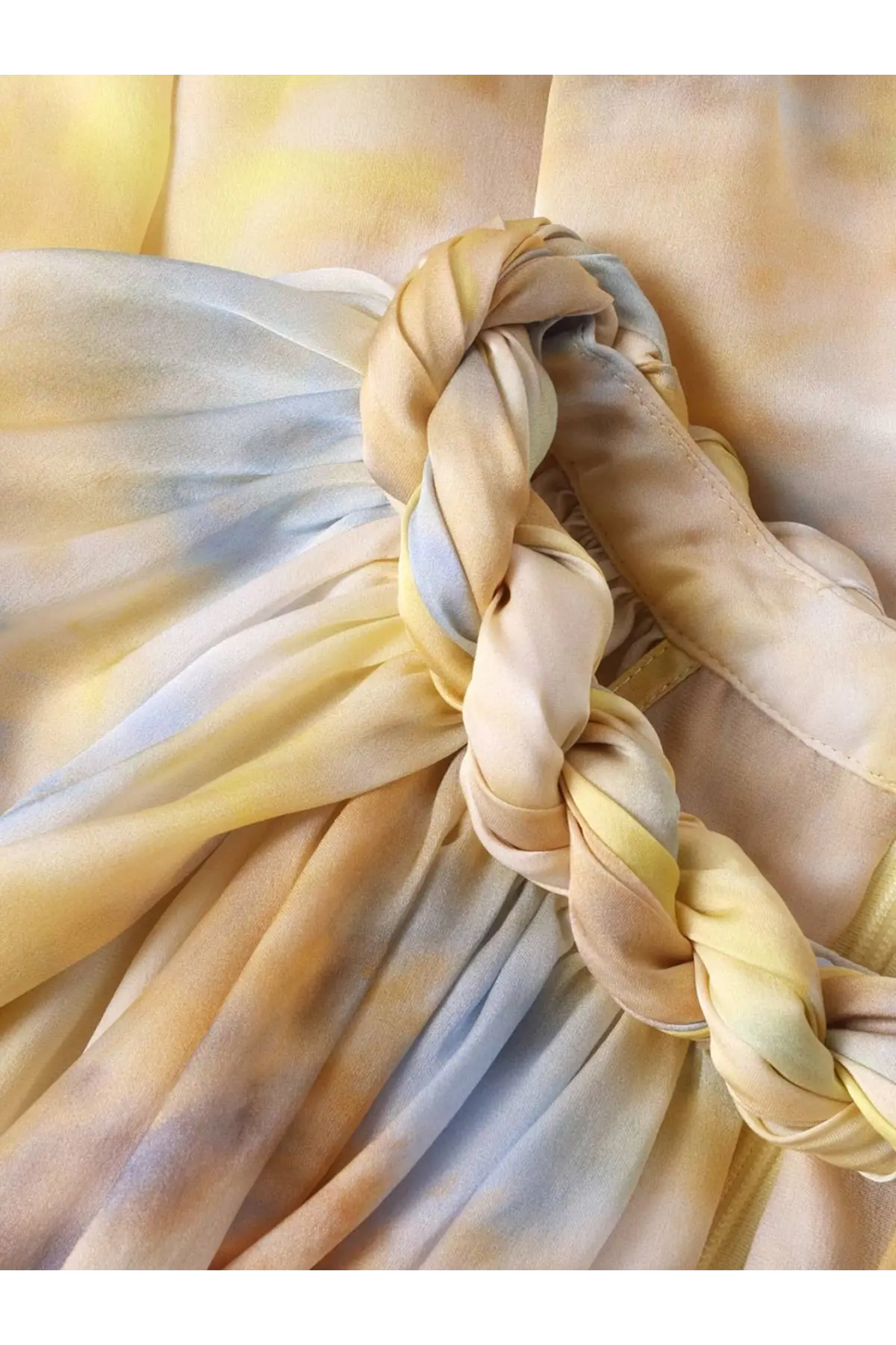 Zimmermann women’s alchemy twist billow silk top brown paired with a delicate pale yellow and light blue silk scarf