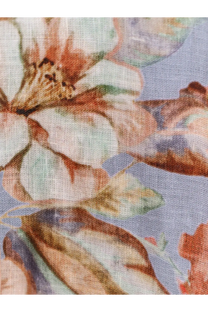 A delicate light blue fabric scarf with a soft peach and muted green floral pattern paired with zimmermann womens awaken long linen dress orange