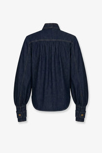 Zimmermann women’s cargo denim shirt blue in dark blue with gathered back and buttoned cuffs shown from the back