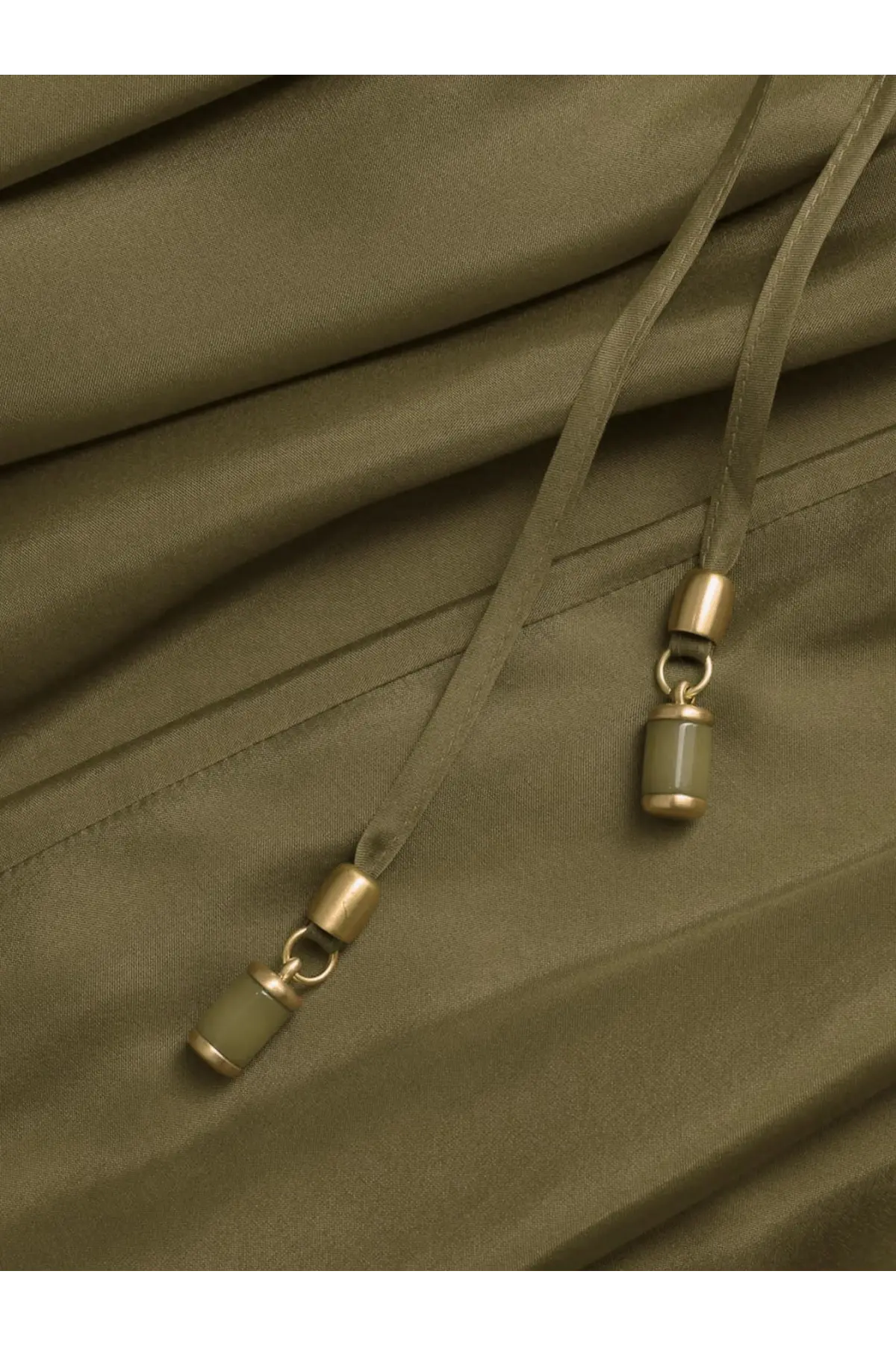 Olive green drawstring with metallic gold toned toggles on the back of zimmermann women’s indra silk dress green