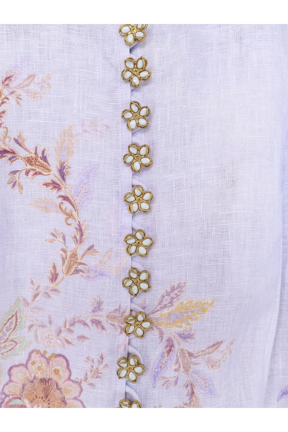 Zimmermann women’s luna button linen dress blue features gold-toned floral buttons with white center accents on light lavender fabric
