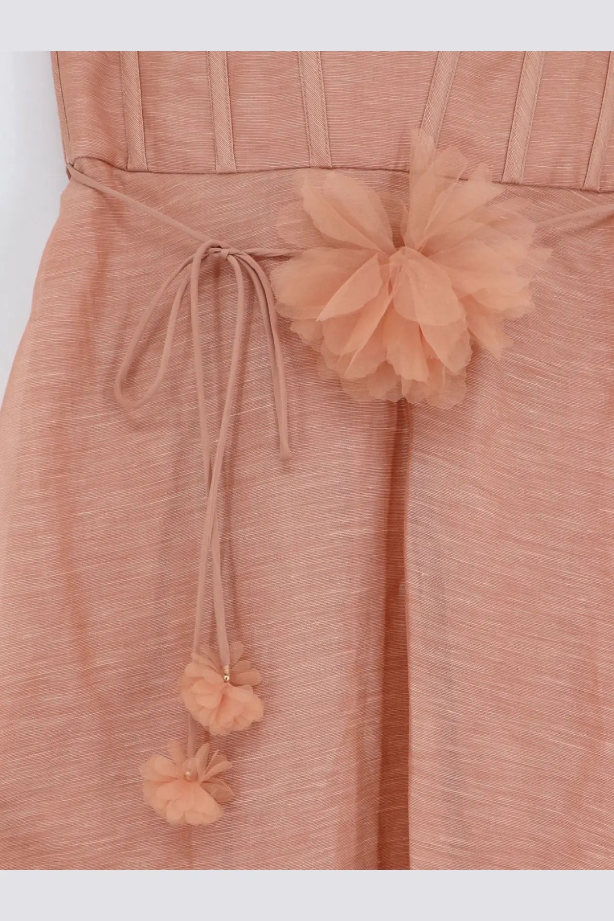 Zimmermann women’s luna silk and linen blend midi dress in peony with textured fabric, vertical pleats, and tulle flower waist embellishment