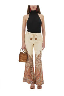Zimmermann women’s cream-colored wide-leg pants in beige with paisley pattern and fabric waist tie
