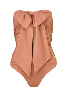 Zimmermann women’s one piece swimsuit in soft peach ruched bandeau style with large flowing bow front detail