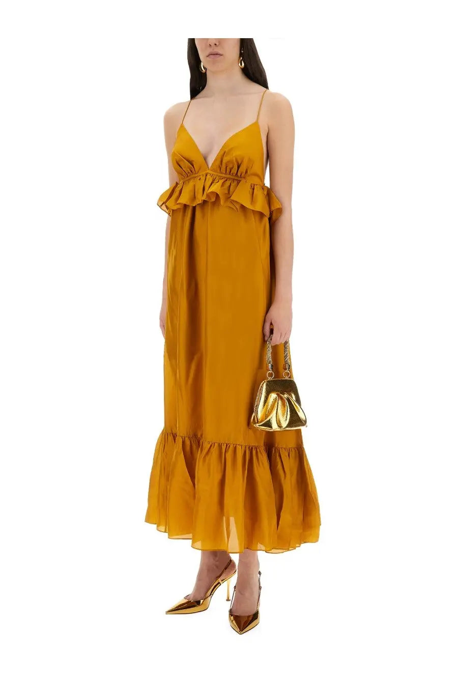 Zimmermann women’s rhiannon dress gold is a flowing mustard-yellow maxi dress with ruffled neckline and hem in lightweight fabric