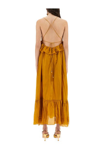 Zimmermann women’s rhiannon dress gold flowing mustard yellow maxi dress with ruffled back and crisscrossed straps back view