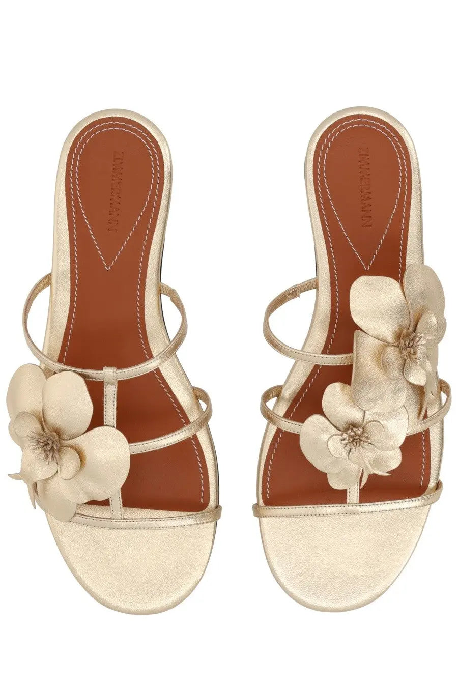 Zimmermann women’s cream leather sandals with delicate floral embellishments and sleek minimalist design orchid gold