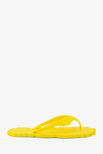 Zimmermann women’s seafoam yellow rubber thong flip flop with bright yellow scalloped edge and sleek design