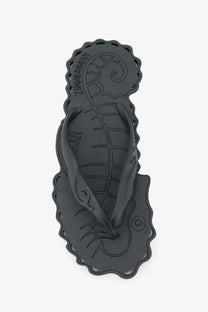 Black rubber Zimmermann women’s seafoam thong sandal with seahorse design and scalloped edges