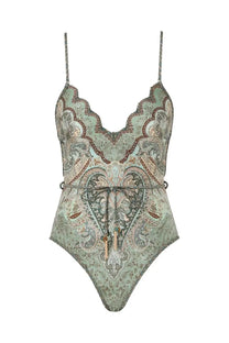 Zimmermann women’s Wonderlust one-piece swimsuit with muted green and beige paisley pattern and scalloped neckline
